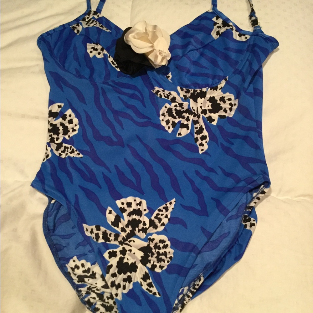 Oscar De La Renta swim suit and Jacket